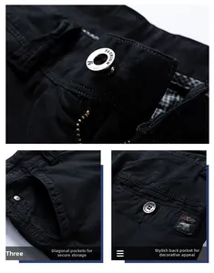Close-up of metal buttons and pocket details on black cotton cargo shorts for men