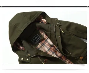 Detail view of olive green jacket featuring high-quality stand collar and plaid lining