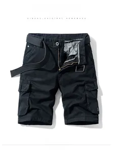 Flat lay of black cargo shorts with woven belt and multiple functional pockets