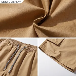 Men's khaki cargo shorts with elastic drawstring waist and premium stitching detail