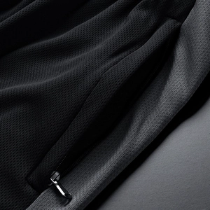 Men's summer black breathable mesh sportswear set with a secure zipper pocket detail