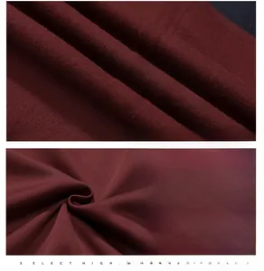 Macro shot of breathable wine red knit cotton fabric with soft texture and anti-pilling
