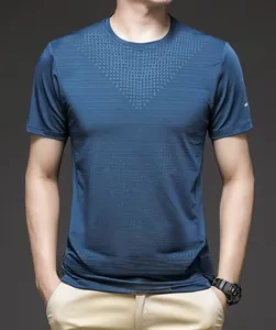 Close-up of blue quick-dry T-shirt with breathable honeycomb texture and crew neck