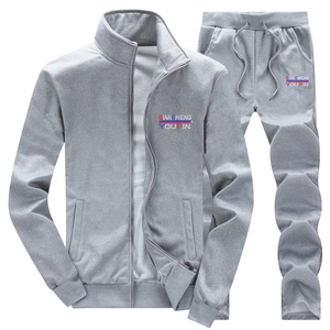 Detail of grey athletic tracksuit with stand-up collar zip jacket and drawstring joggers
