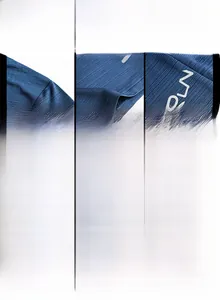Detailed macro view of navy blue ice silk fabric with breathable weave and RUN logo