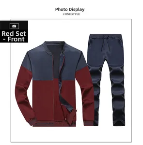 Front view of two-piece tracksuit featuring color-block jacket and drawstring joggers