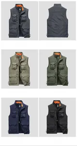 Detail view of multi-pocket outdoor vest with breathable orange mesh lining and stand collar