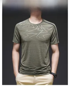 Close-up of army green ice silk T-shirt with geometric embossing and reflective dots