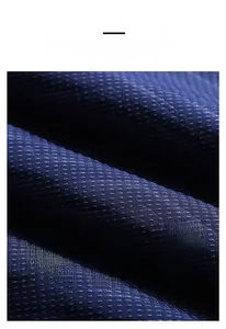 Macro detail of dark blue ice silk fabric showing cross-knit texture and durable mesh