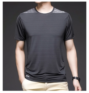 Close-up of quick-dry men's sports t-shirt with grey shoulder stitching and GORUN logo
