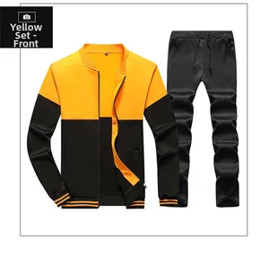 Detailed view of yellow and black color-block tracksuit with drawstring and ribbed cuffs