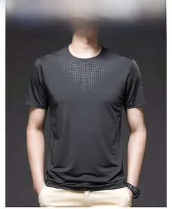 Close-up of men's dark grey ice silk t-shirt featuring dot-matrix breathable fabric texture