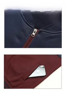 Detail of high-quality metal zipper and functional side pockets on men's casual tracksuit