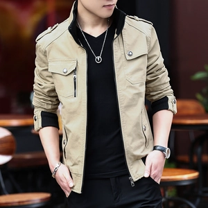 Men's khaki multi-pocket casual jacket with stand collar and ribbed cuffs in outdoor setting