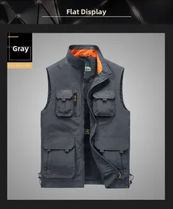 Detail of dark grey tactical vest showing multiple utility pockets and orange mesh lining