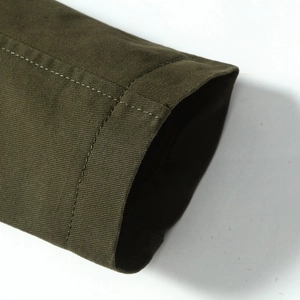 Army green men's casual jacket sleeve detail showing durable twill cotton fabric and stitching