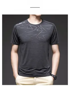 Detail shot of men's dark grey ice silk t-shirt with geometric breathable mesh texture