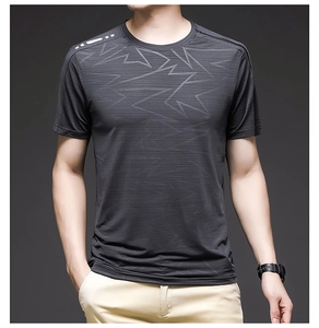 Detail of grey mesh cooling T-shirt featuring shoulder reflective strip and geometric print