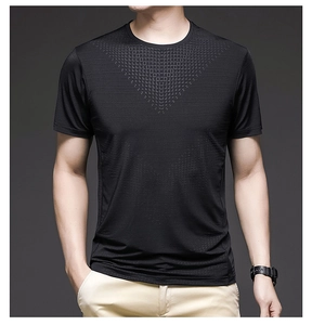 Detail of black ice silk t-shirt featuring breathable geometric laser-cut micro-holes