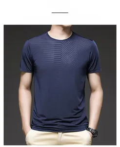 Close-up of navy blue ice silk T-shirt showing fine grid texture and round neck detail