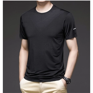 Detail of black ice silk t-shirt featuring geometric patterns and reflective sleeve stripes