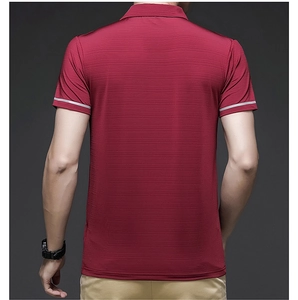 Detail view of the wine red ice silk polo shirt featuring textured fabric and white sleeve trim