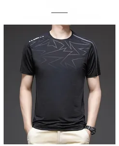 Close-up of black breathable mesh t-shirt with grey geometric pattern and reflective stripes
