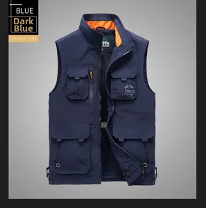 Detail view of deep blue utility vest featuring breathable mesh lining and multiple cargo pockets