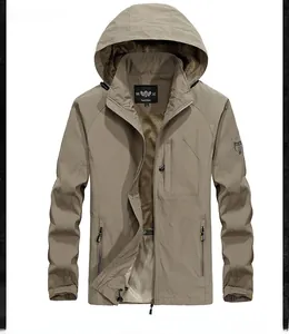 Detailed front view of khaki outdoor jacket with zipper pockets and breathable mesh lining