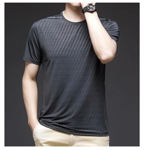 Close-up of the fine striped texture and white shoulder line detail on grey sports t-shirt