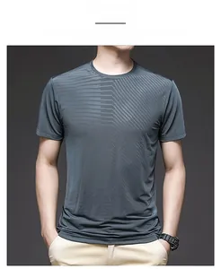 Detailed macro shot of dark grey-blue ice silk T-shirt fabric with breathable mesh texture