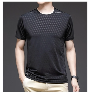 Close-up of men's black quick-dry t-shirt with vertical stripes and shoulder detail