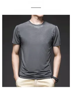 Detailed close-up of dark grey ice silk mesh fabric on a breathable men's t-shirt