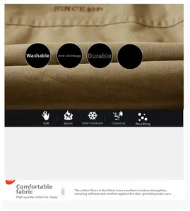 Detail of khaki twill cotton fabric with embroidery showing soft warm texture