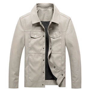 Detailed view of light grey faux leather jacket with lapel collar and front flap pockets