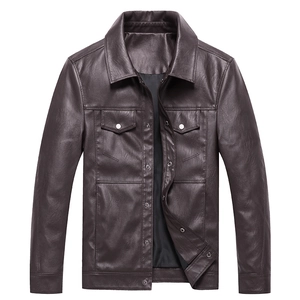 Detail of retro leather jacket with silver snap buttons and flap pockets in dark coffee