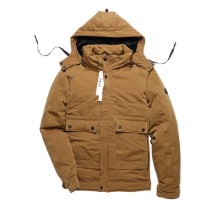 Slim fit men's winter hooded parka jacket with four front utility pockets in mustard tan