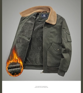 Detail view of military green flight jacket with thick faux fur collar and fleece lining