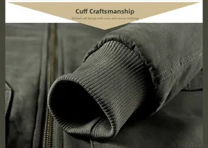 Detail of ribbed cuffs and sturdy zipper on heavy canvas olive green work jacket