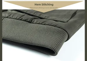 Close-up of olive green jacket ribbed hem with durable reinforced stitching detail