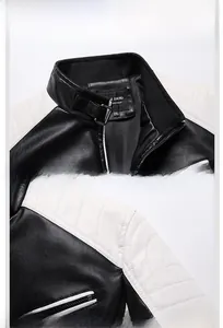 Détail d'une veste motard en similicuir avec boucle au col et épaules matelassées