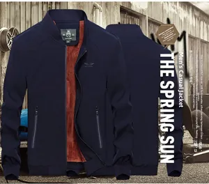 Detail of navy blue men's jacket with warm orange fleece lining and stand collar