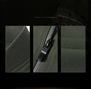 Detailed close-up of dark green jacket rib knit collar and premium black metal fashion zipper