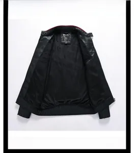 Detail of men motor jacket with stand collar and burgundy knit neck lining
