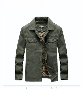 Close-up of olive green military cotton jacket featuring camouflage lining and front pockets