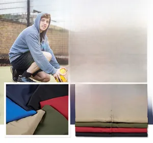 Collage of hooded lightweight outdoor jackets in navy, blue, khaki, green, red and black