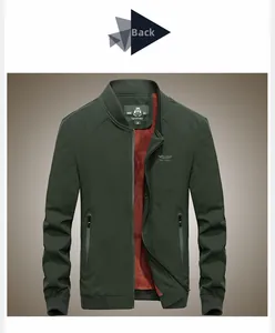 Detailed close-up of dark green bomber jacket with warm red fleece lining and ribbed collar