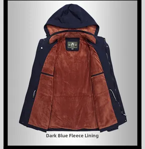 Detail of navy hooded jacket featuring warm caramel fleece lining and metal zipper