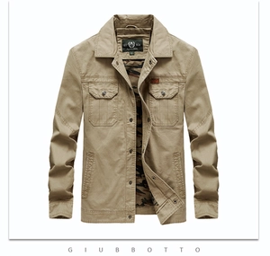 Flat lay of khaki cotton utility jacket with camo lining and flap chest pockets
