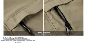 Detail display of khaki jacket zipper pocket with branded black webbing and woven fabric